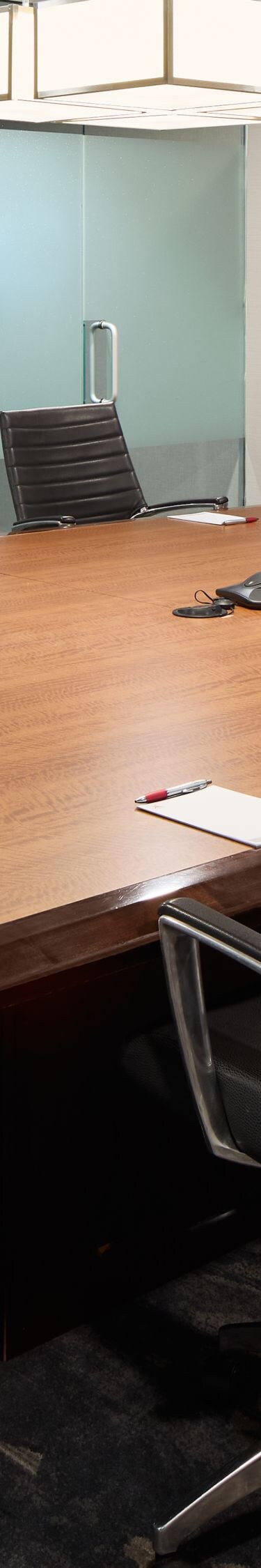 Boardroom with table and wall display
