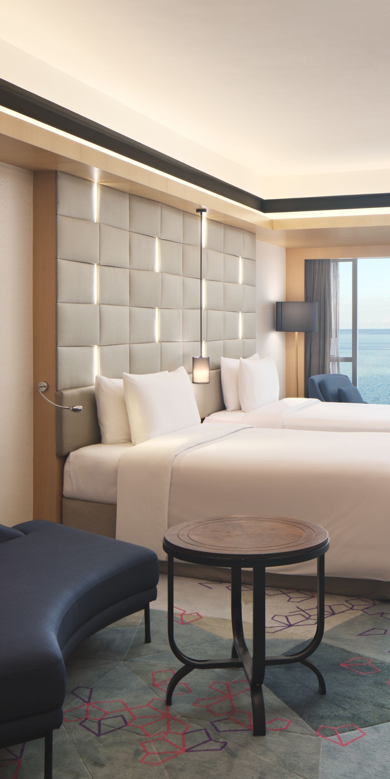 Two-bed guest room with sea view