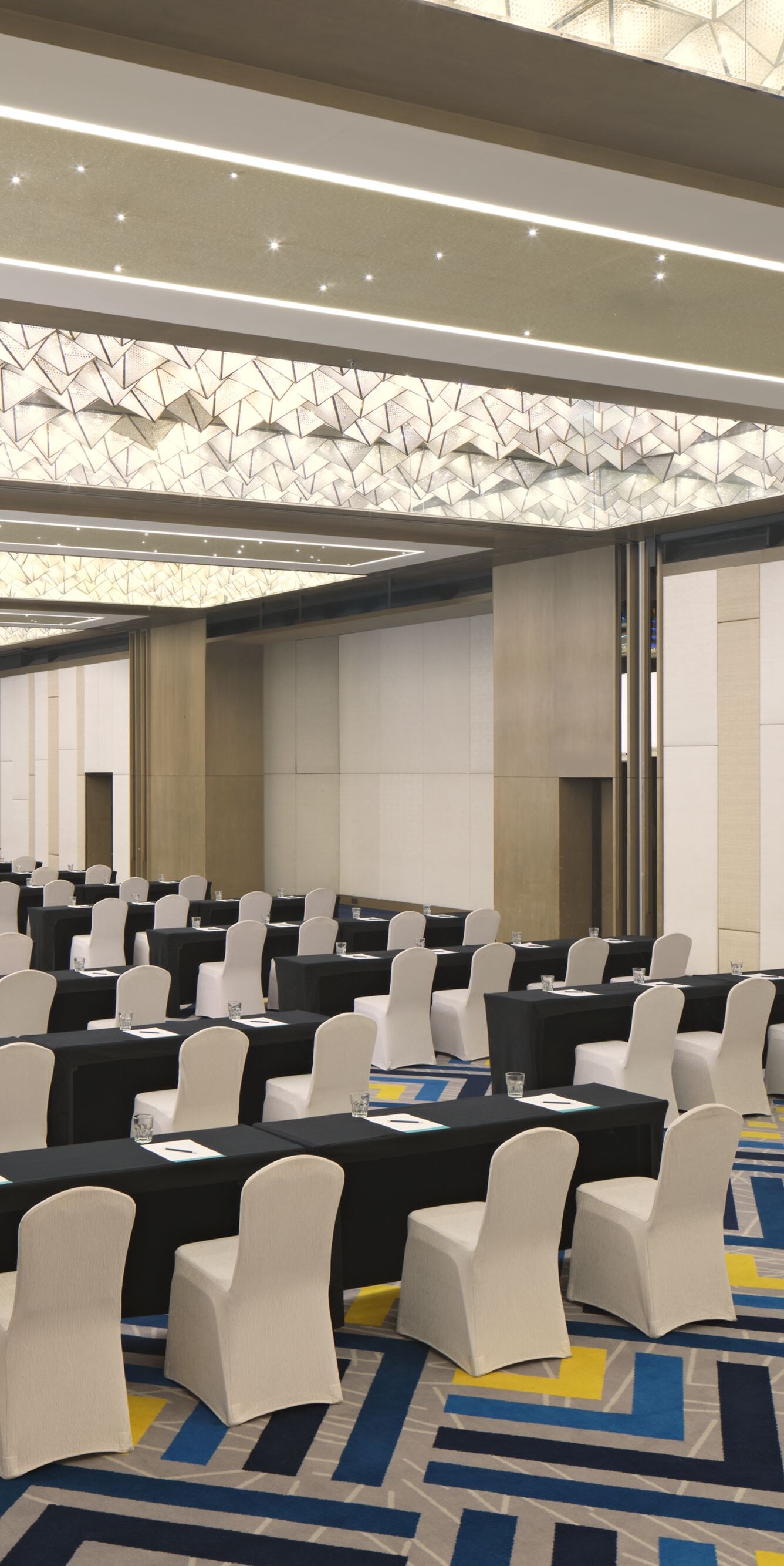Ballroom with classroom setup and lighting