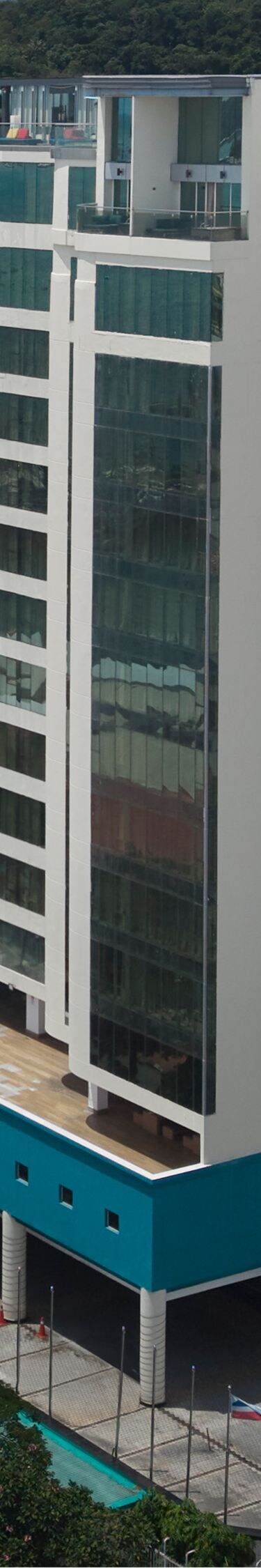 Aerial view of building with rooftop pool