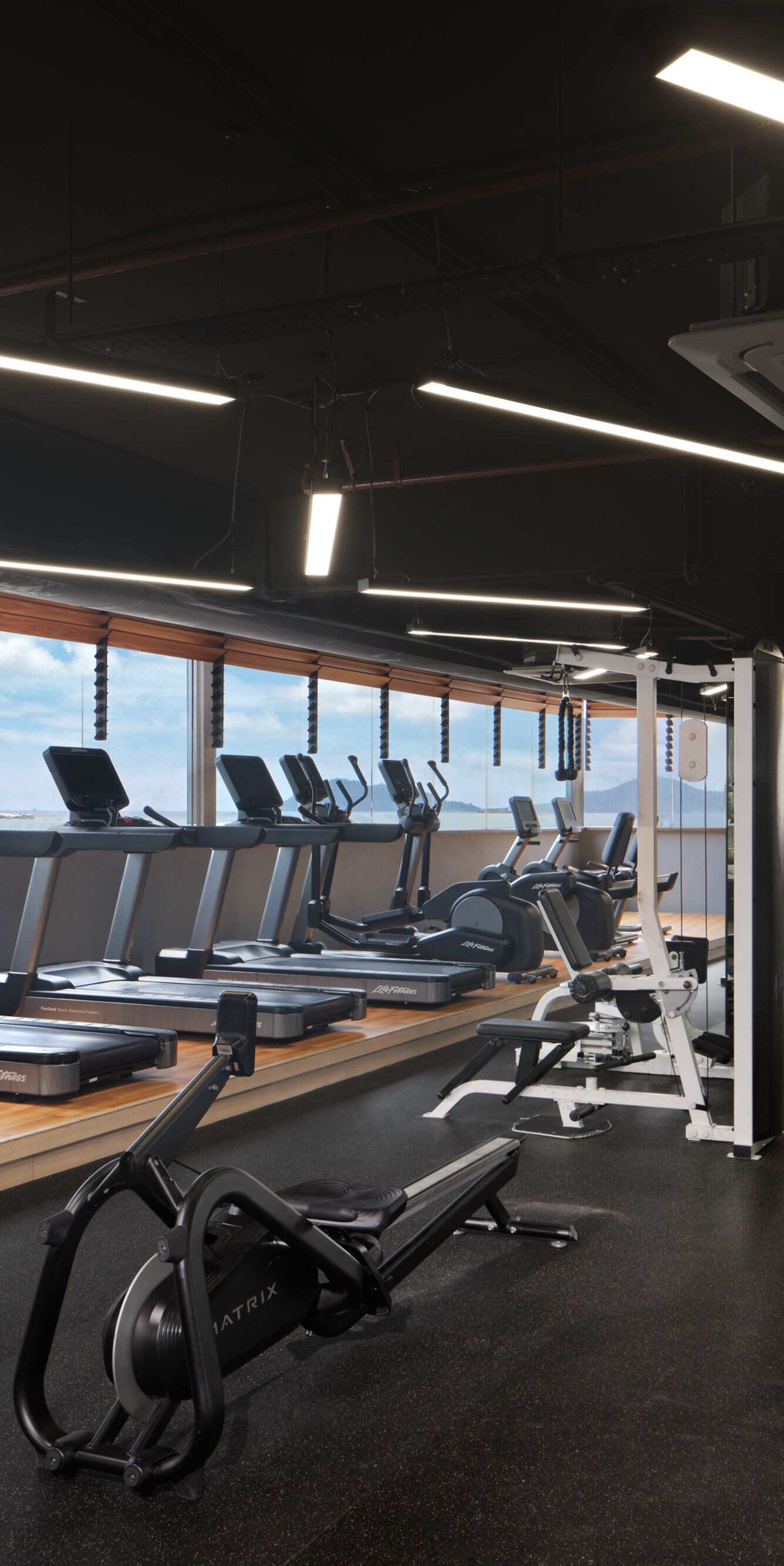Fitness center with sea views