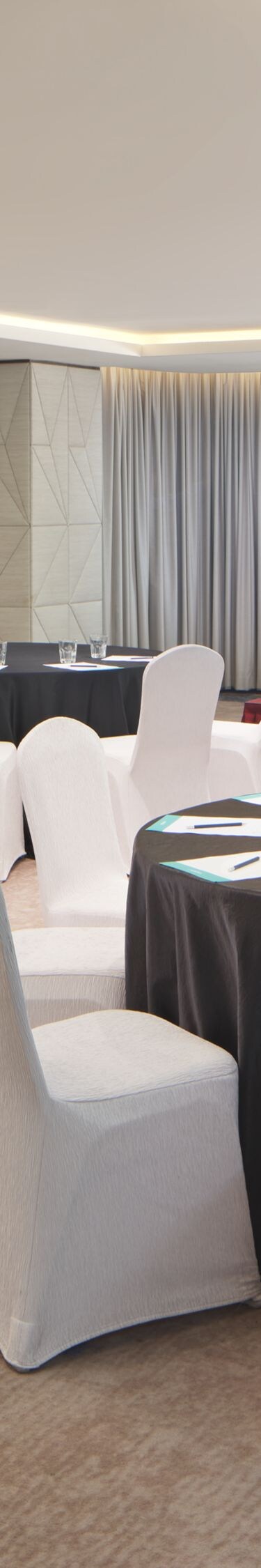 Meeting room with sea views and banquet setup