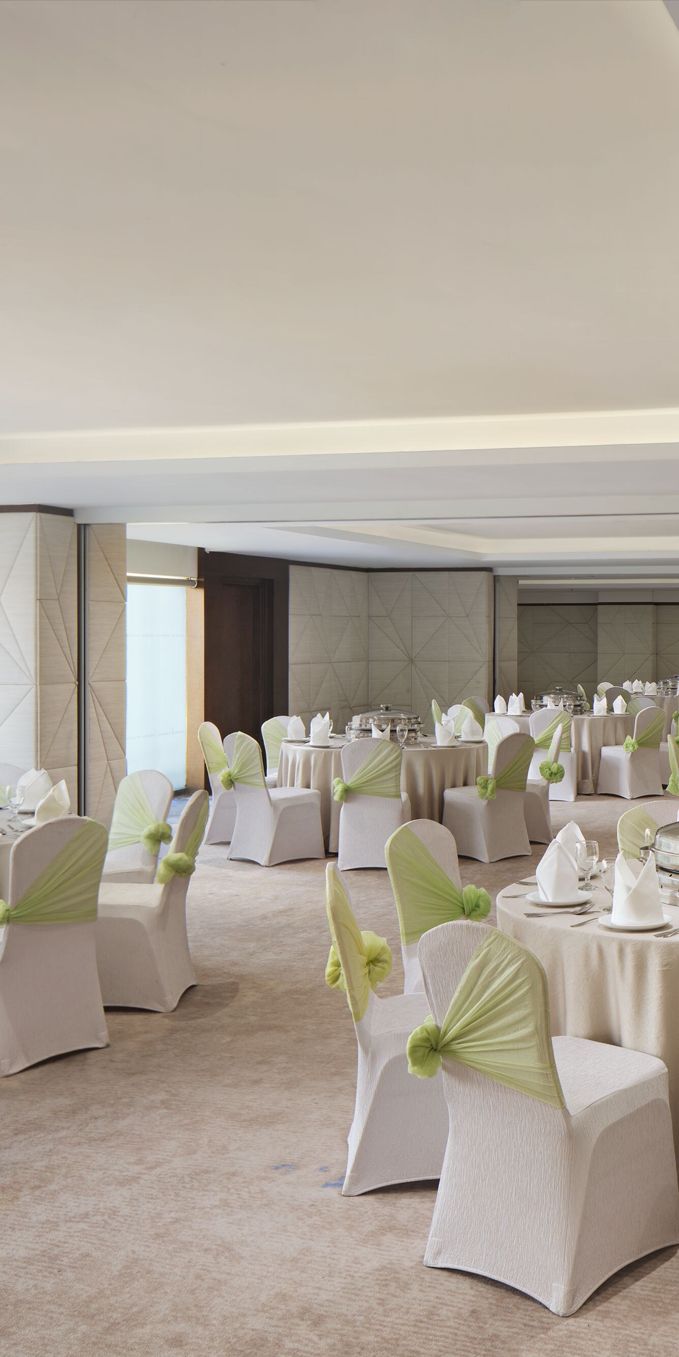 Ballroom with banquet setup and sea views
