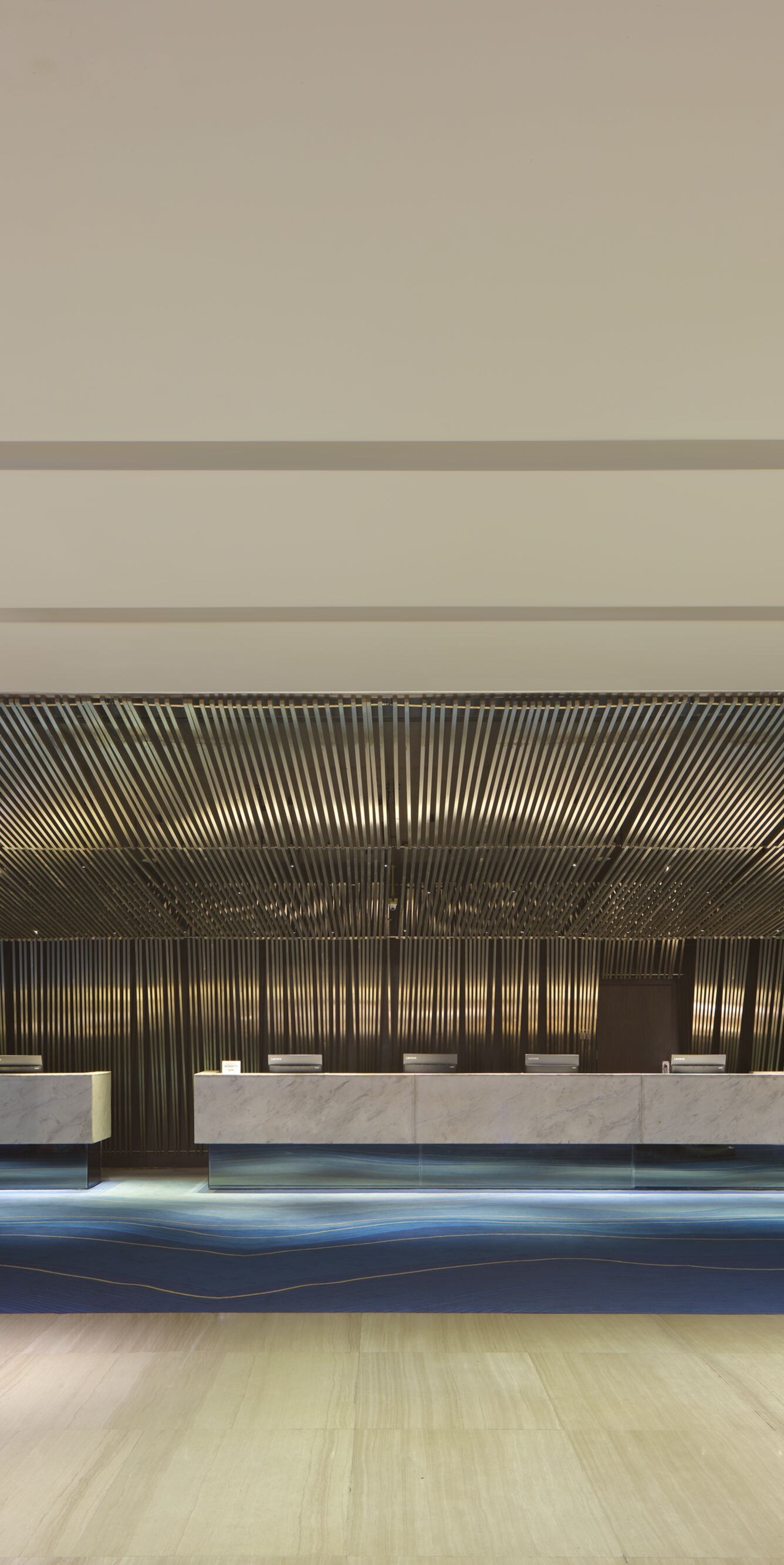 Lobby with marble reception and seating