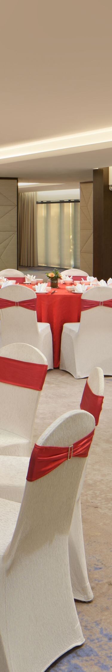 Ballroom with banquet setup and sea view