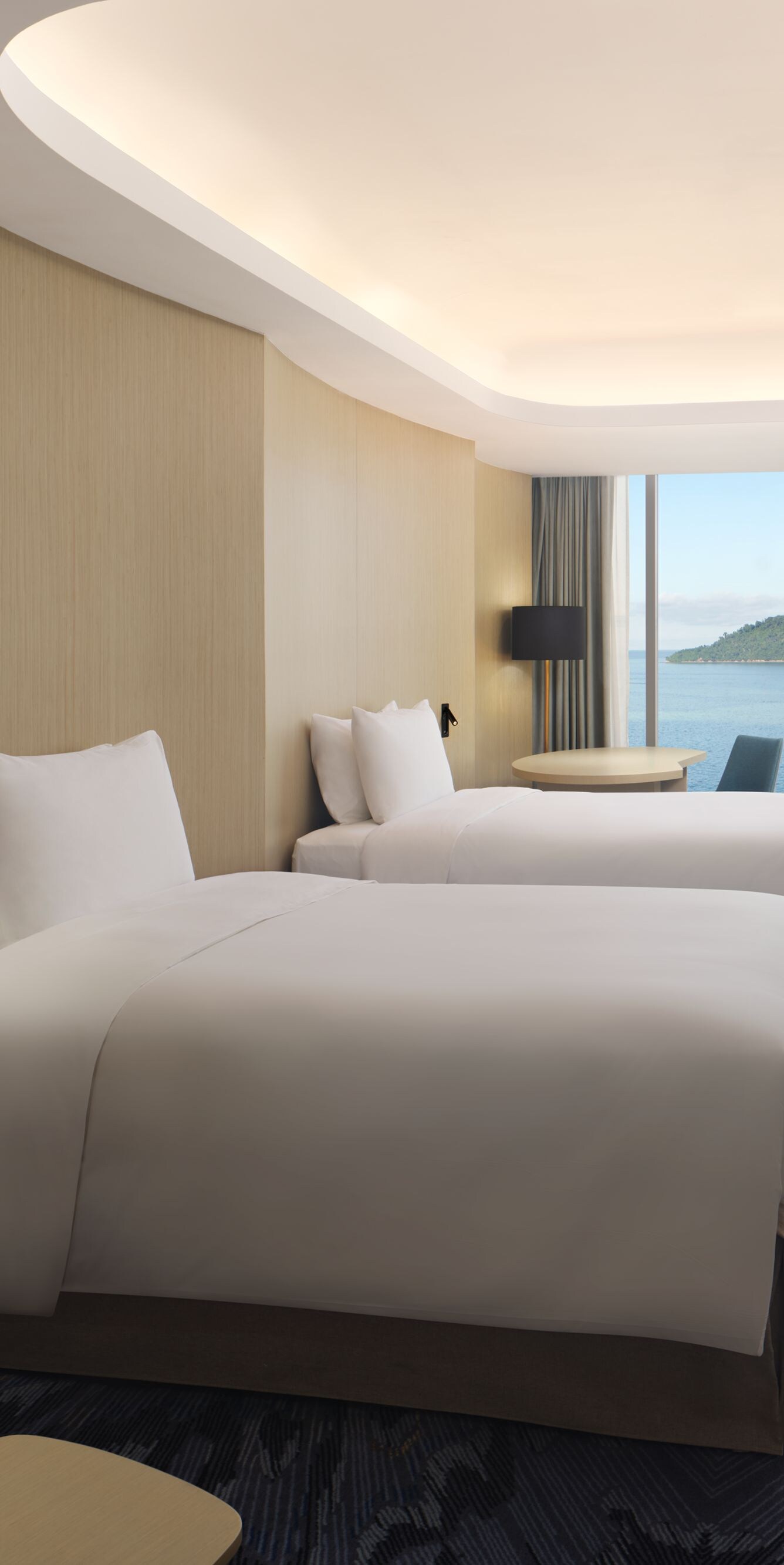Two double beds with sea view and balcony