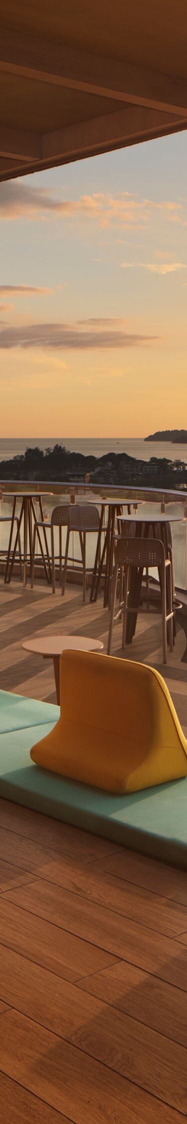 Rooftop bar with sea views at sunset