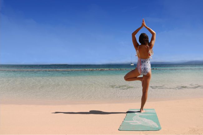 Yoga session on the beach