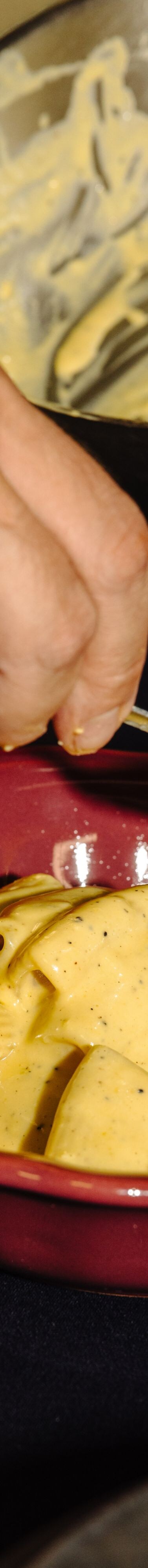 Creamy pasta being plated