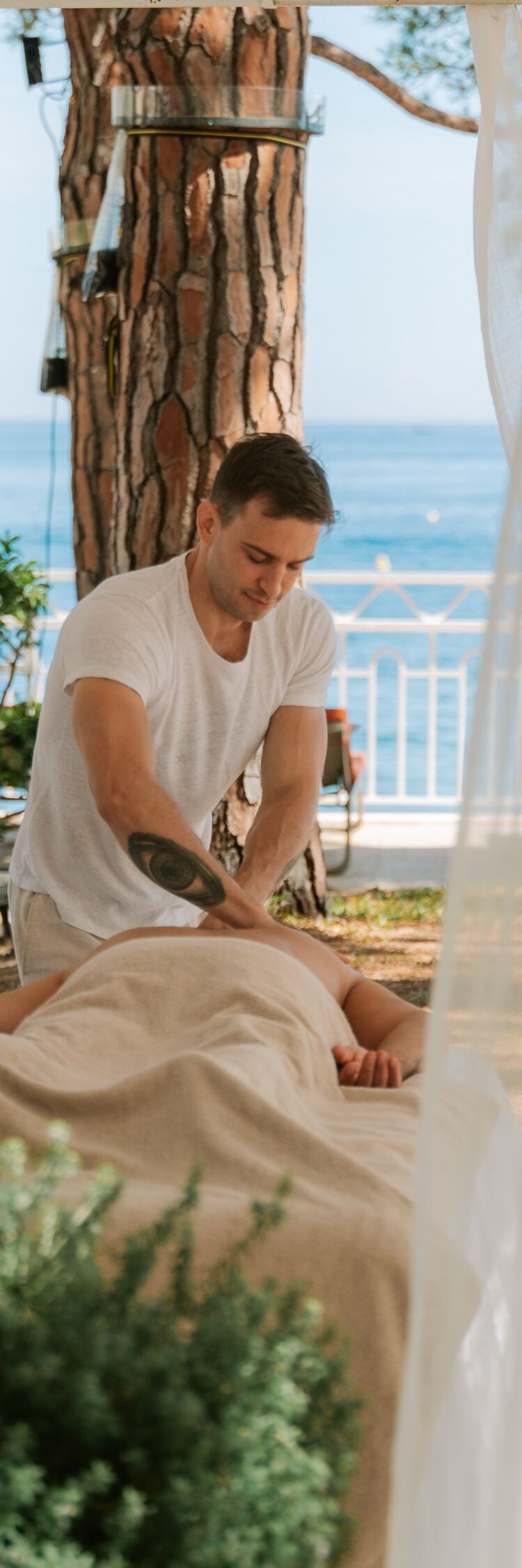 Seaside massage among pine trees