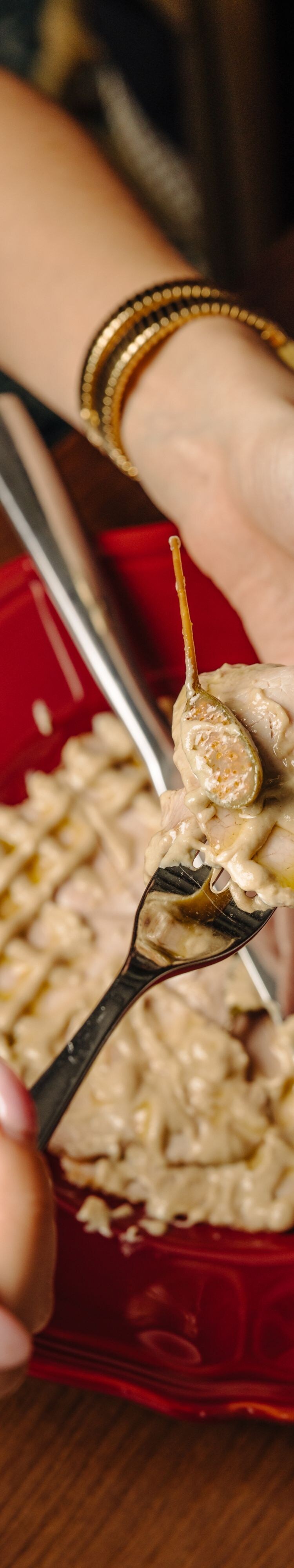 Slice of signature dish on fork