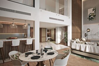 Suite Royale - Vue de la cuisine et de l’espace repas à l’étage inférieur