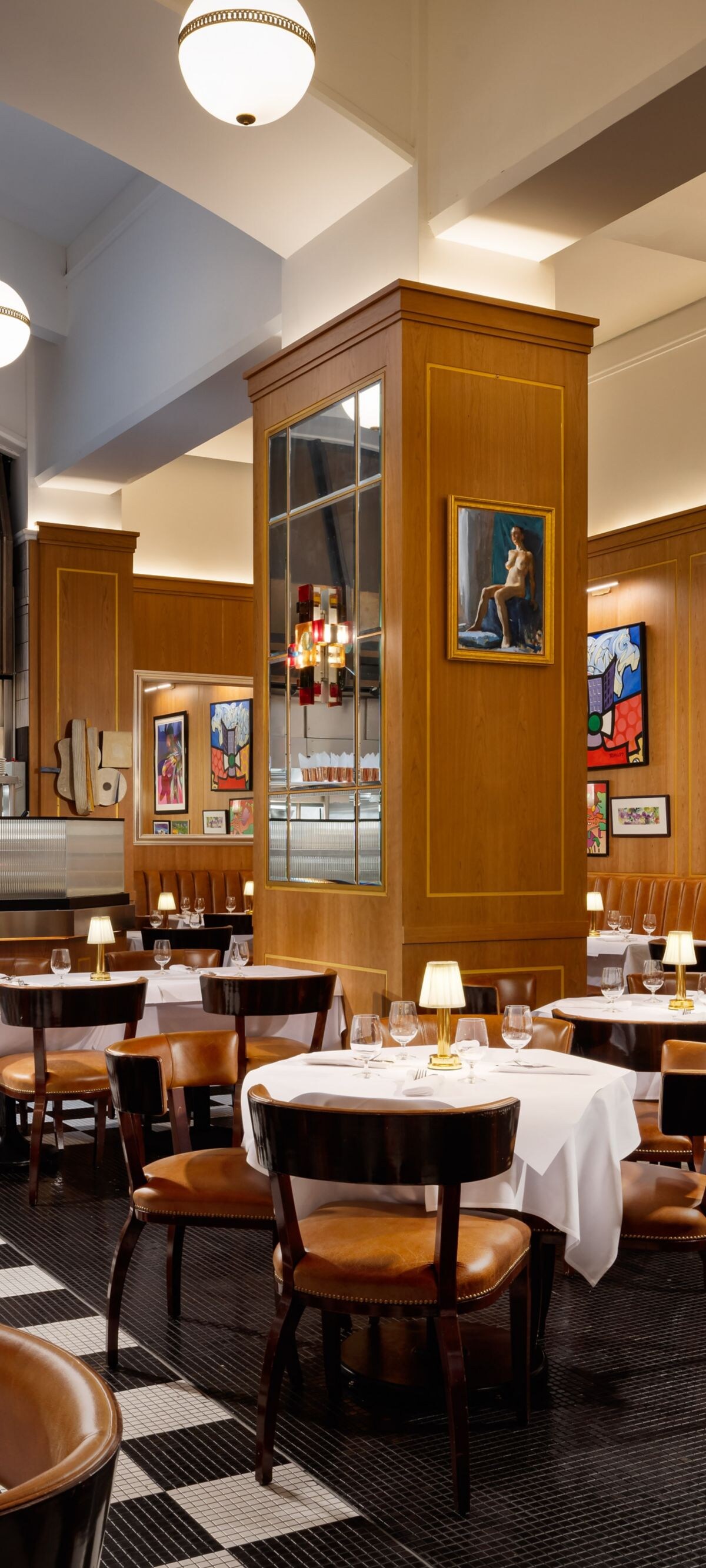Elegant restaurant interior with tables and warm l