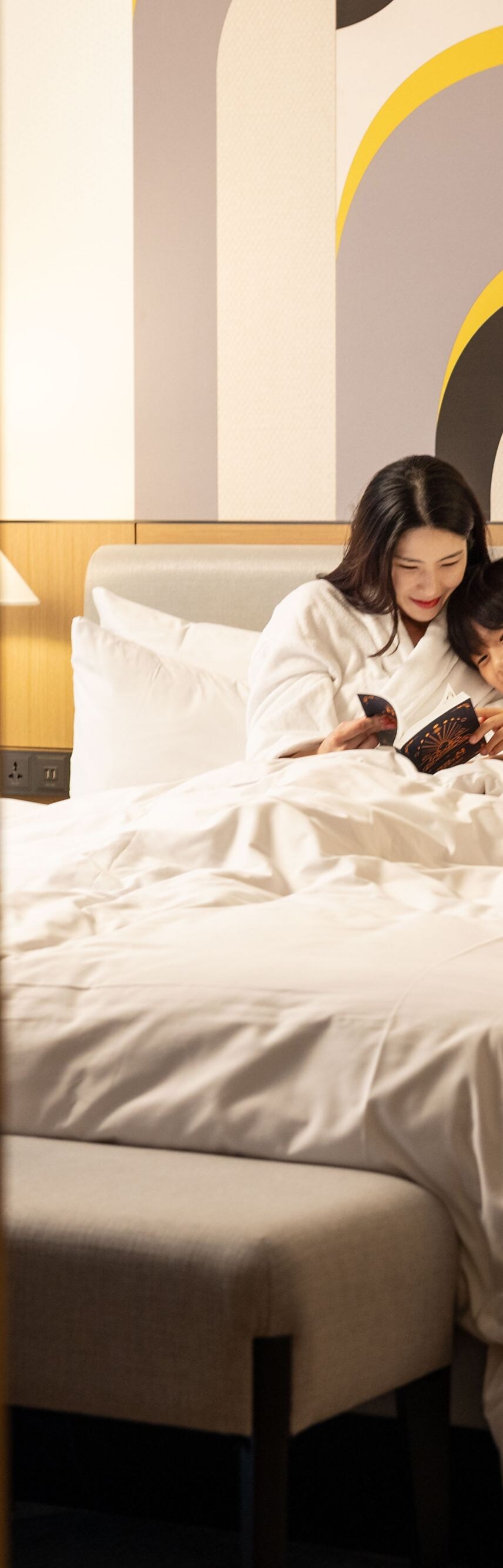 Children relaxing in a guest room
