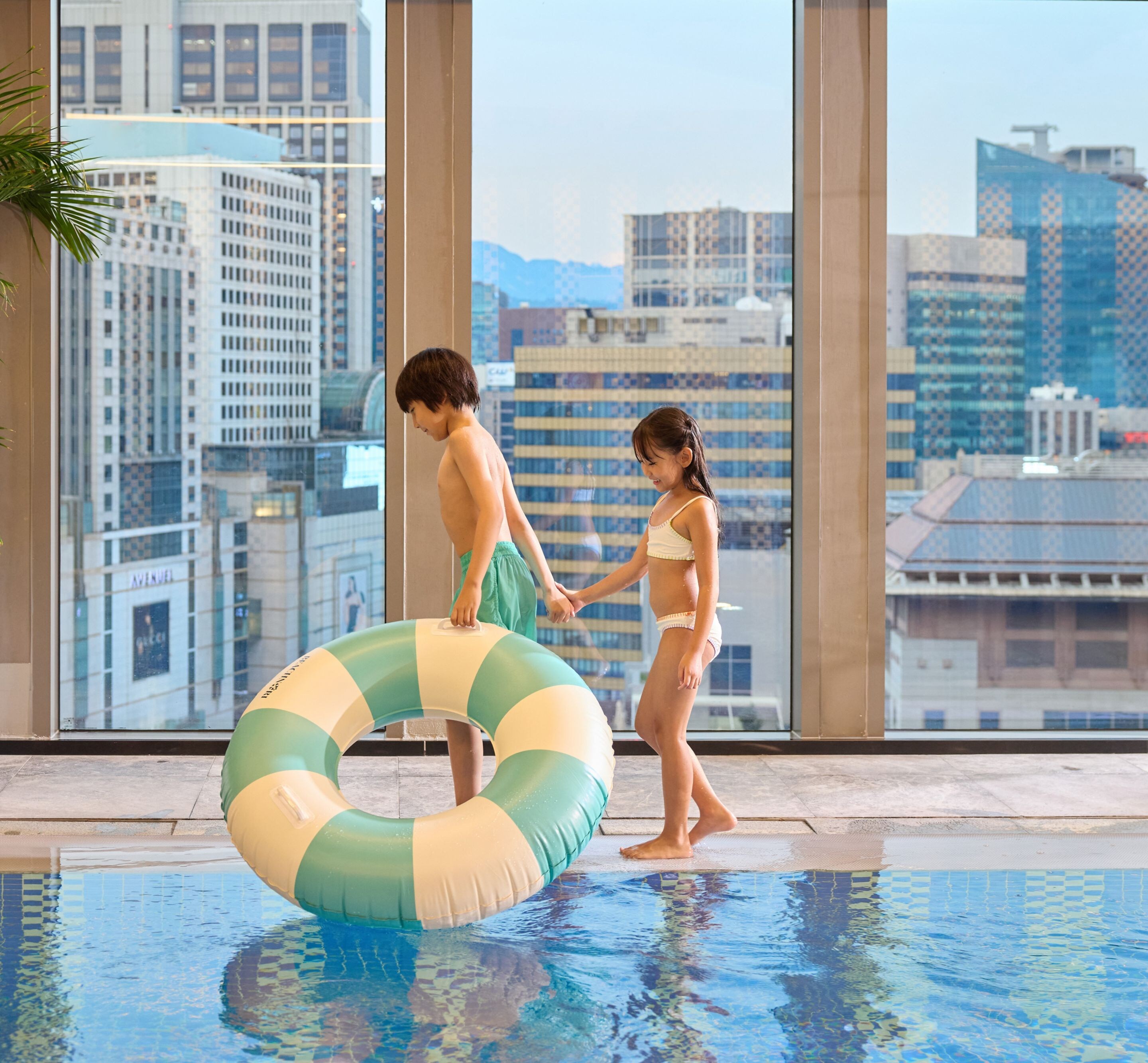 Family spending time by the pool
