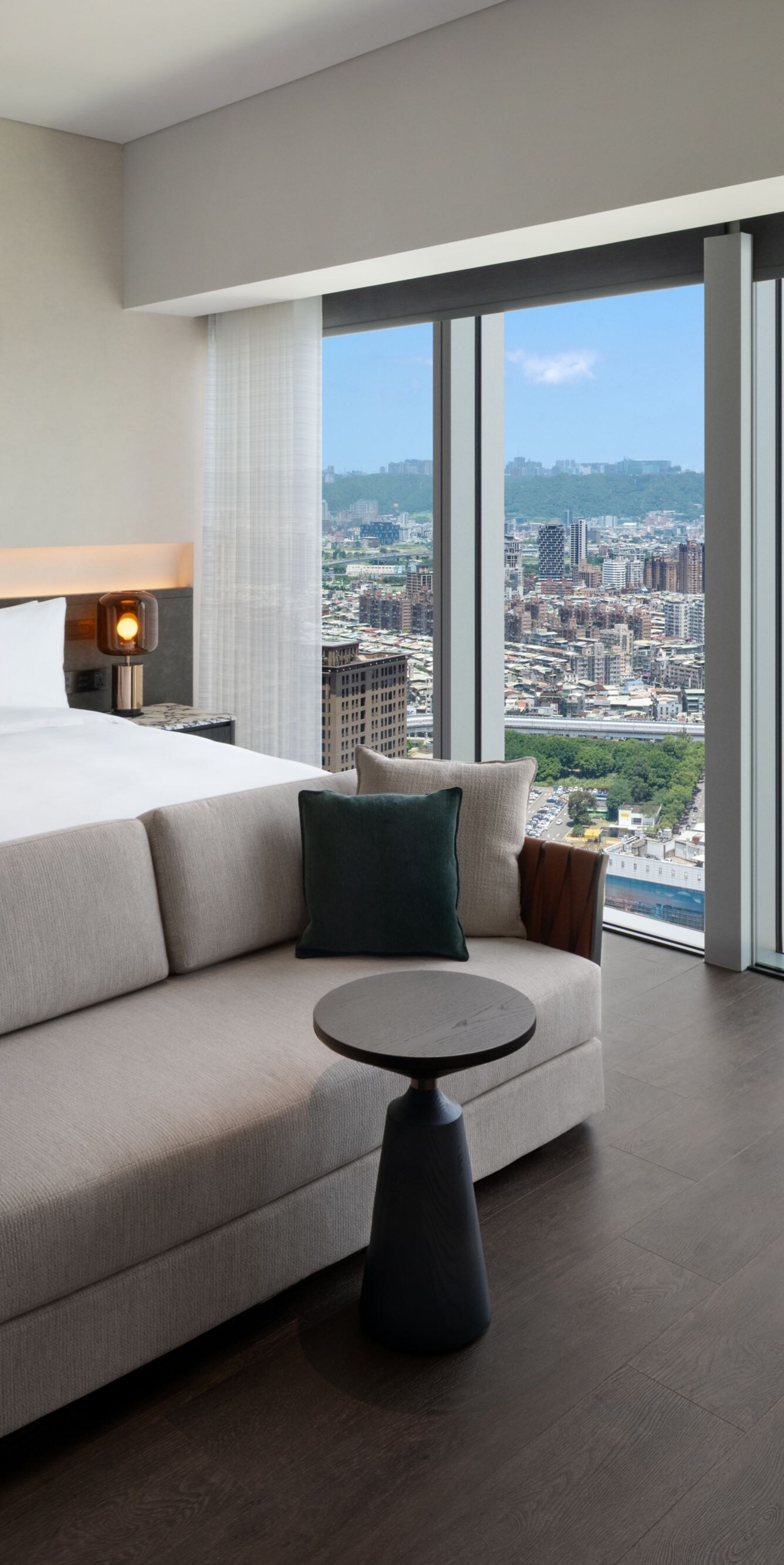 High-floor city view, king bed, desk, sofa