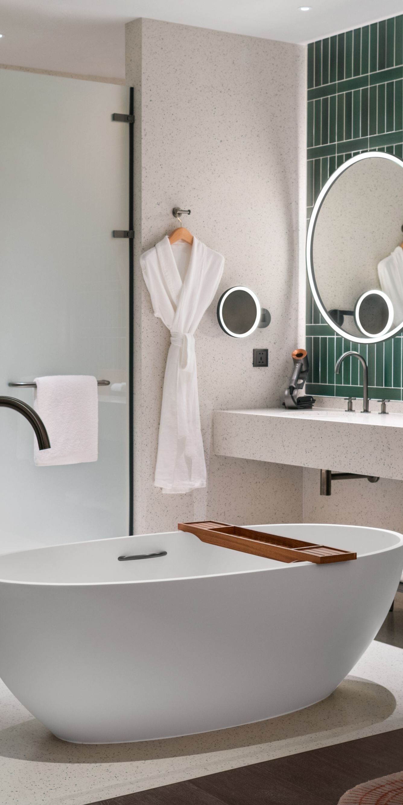  Bathtub, hair dryer, makeup mirror