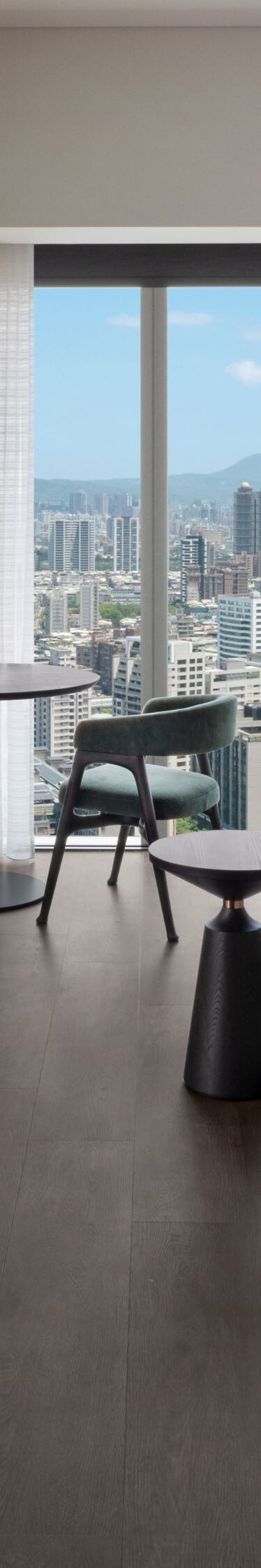 Windows on two sides, wide city views, king bed