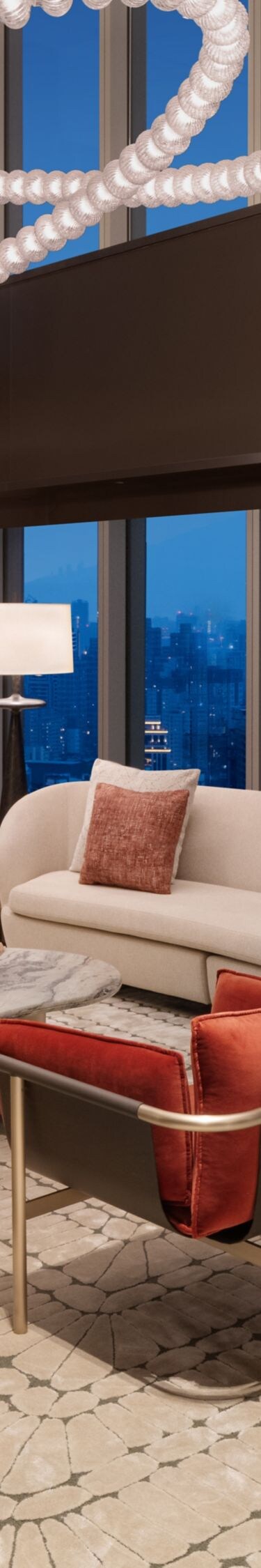 soaring ceilings, Taipei skyline views, sofa,