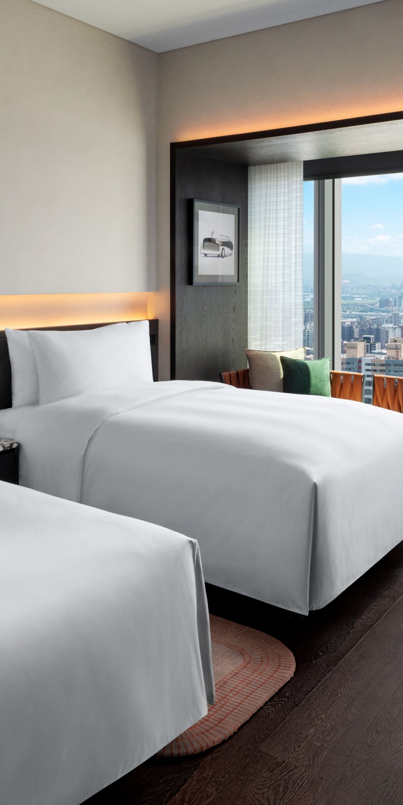 city view, twin bed, desk, sofa