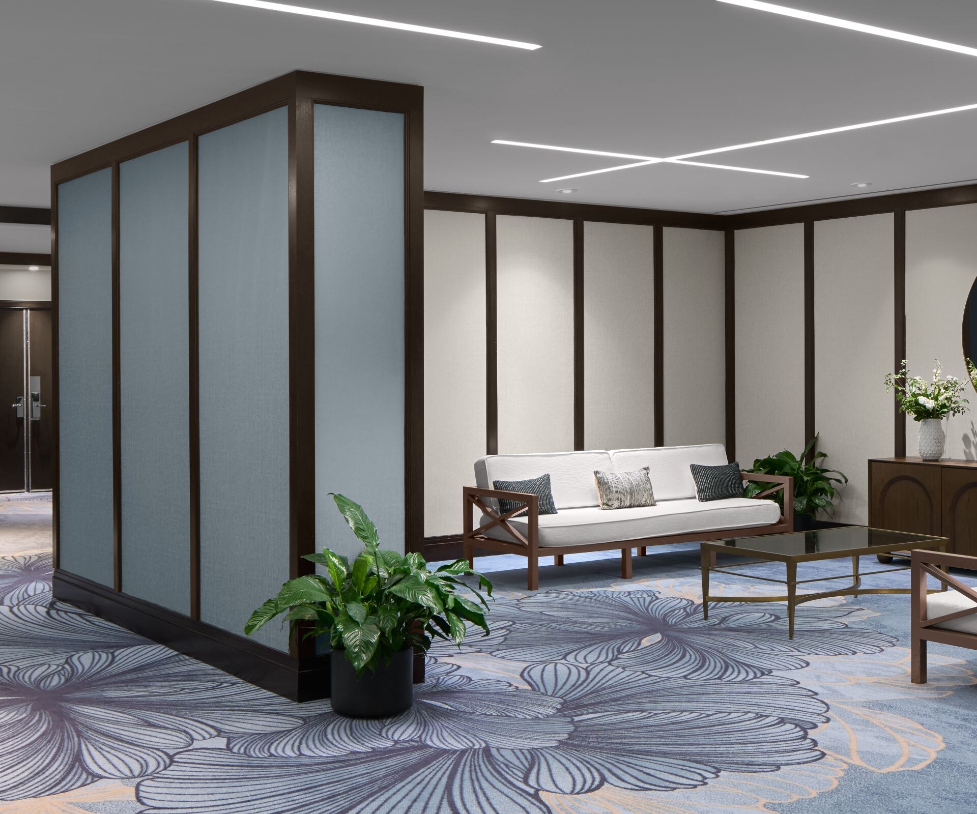 Meeting space with catering and blue carpet