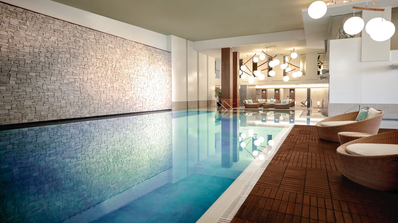 Indoor pool, lounge chairs