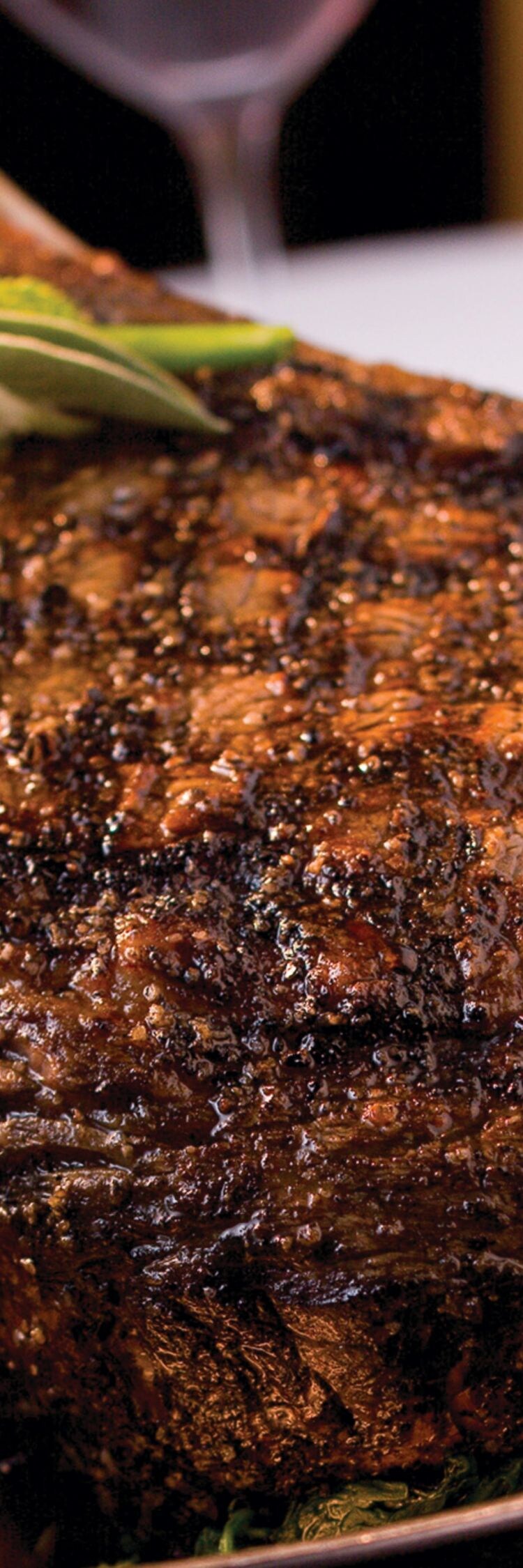 Bone-in steak in dish