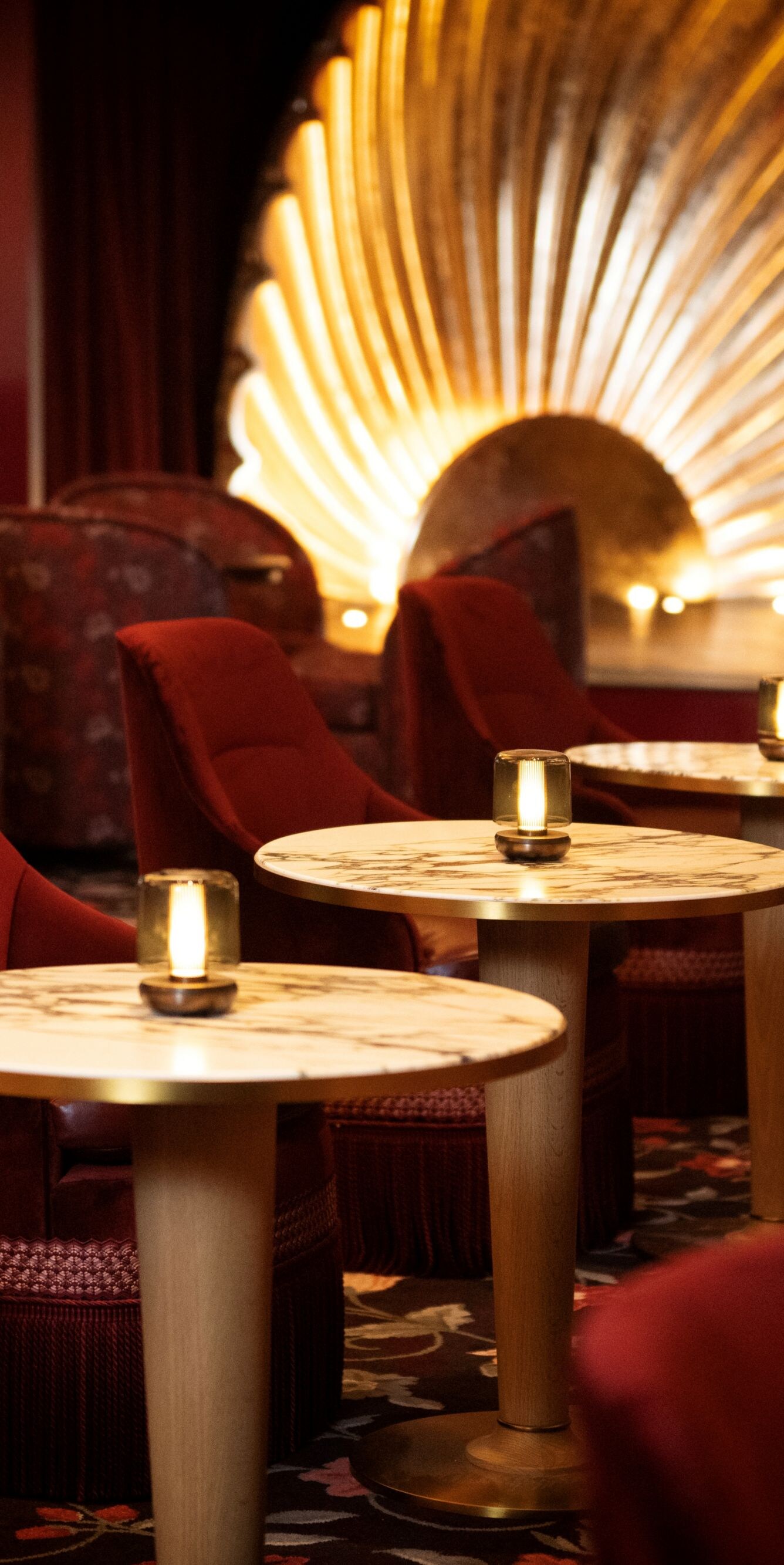 Chairs, cocktail tables, sofa, light fixture.