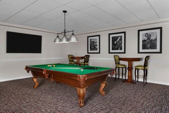 Lounge with billiards and table and chairs