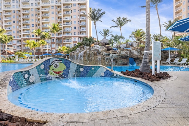 Small children's pool with water sprays  