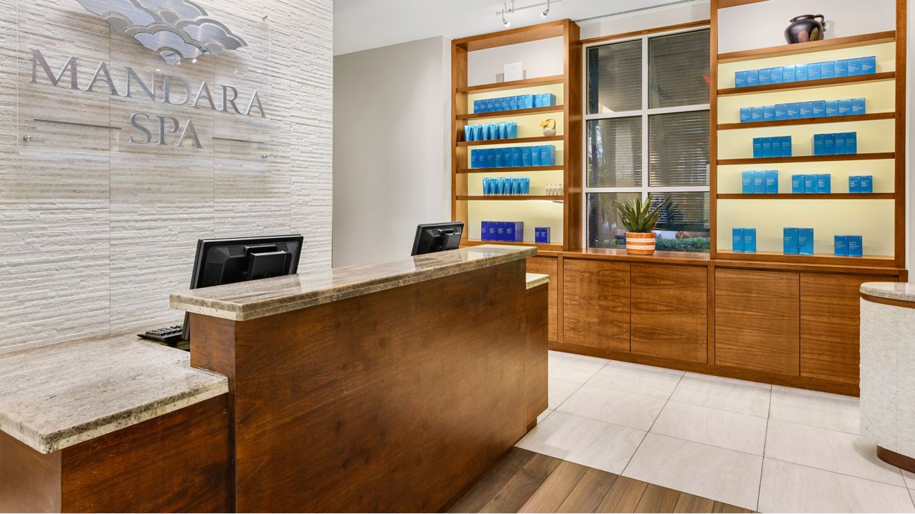 Reception desk with products on shelves