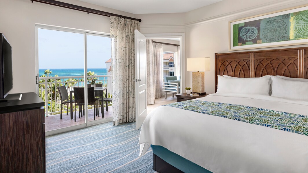 King bed, TV, balcony overlooking ocean 