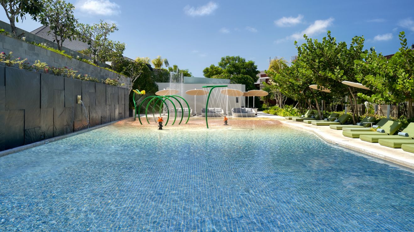 Large kids pool with water features  