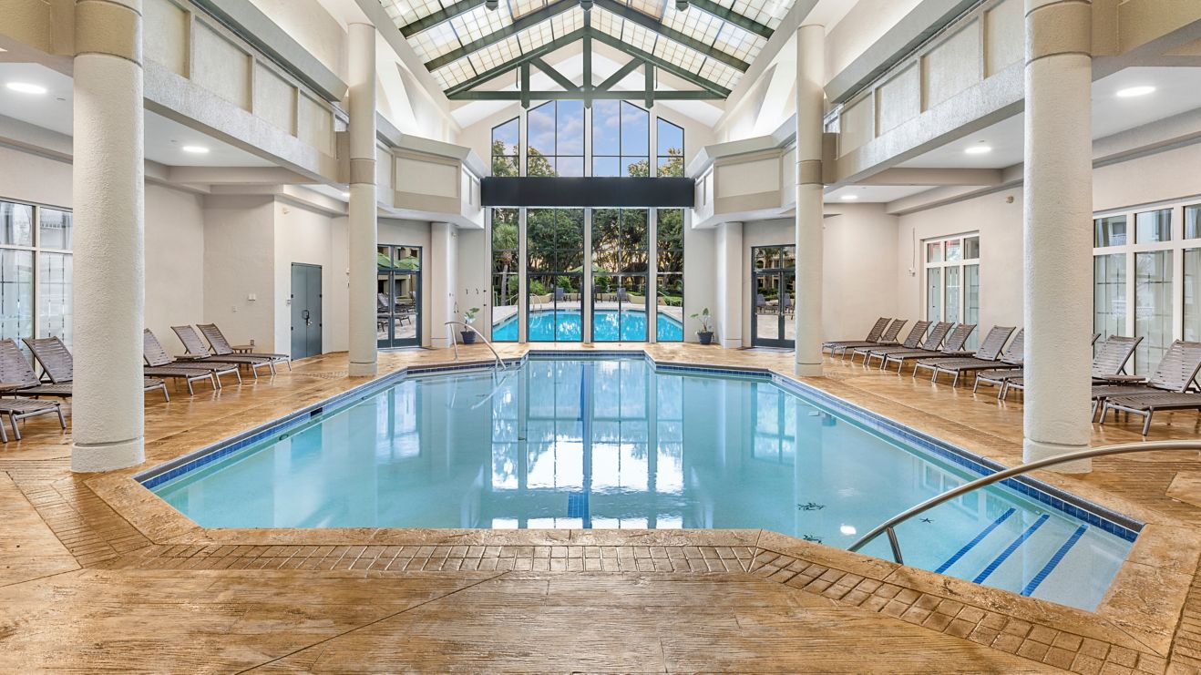 Indoor pool with lounge chairs