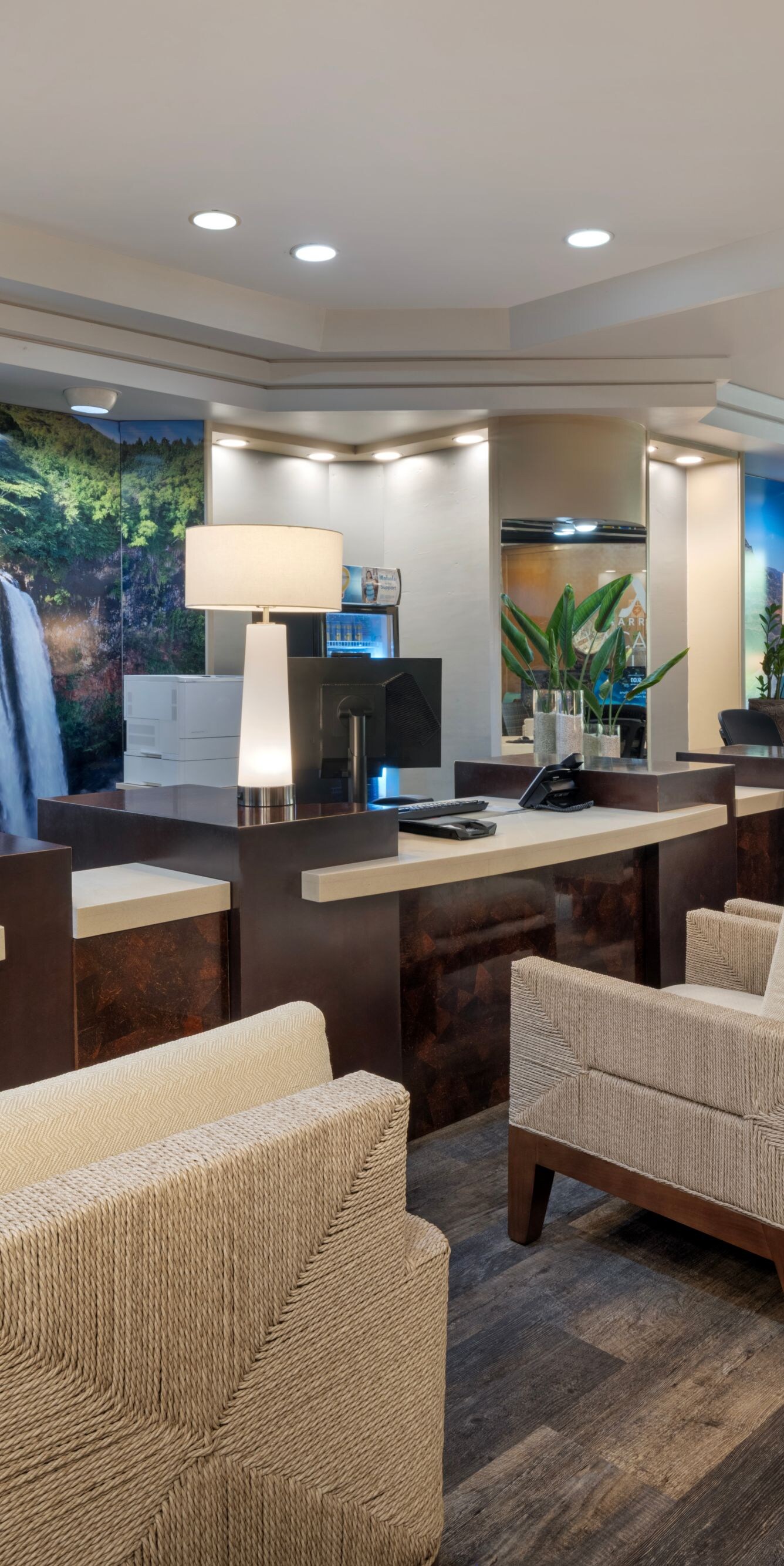 Front desk with seating and wall art