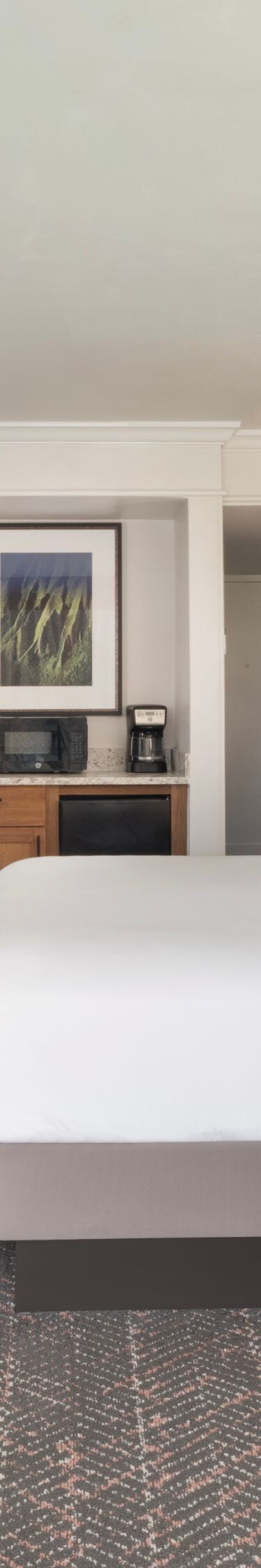 King bed with seating area, TV, microwave