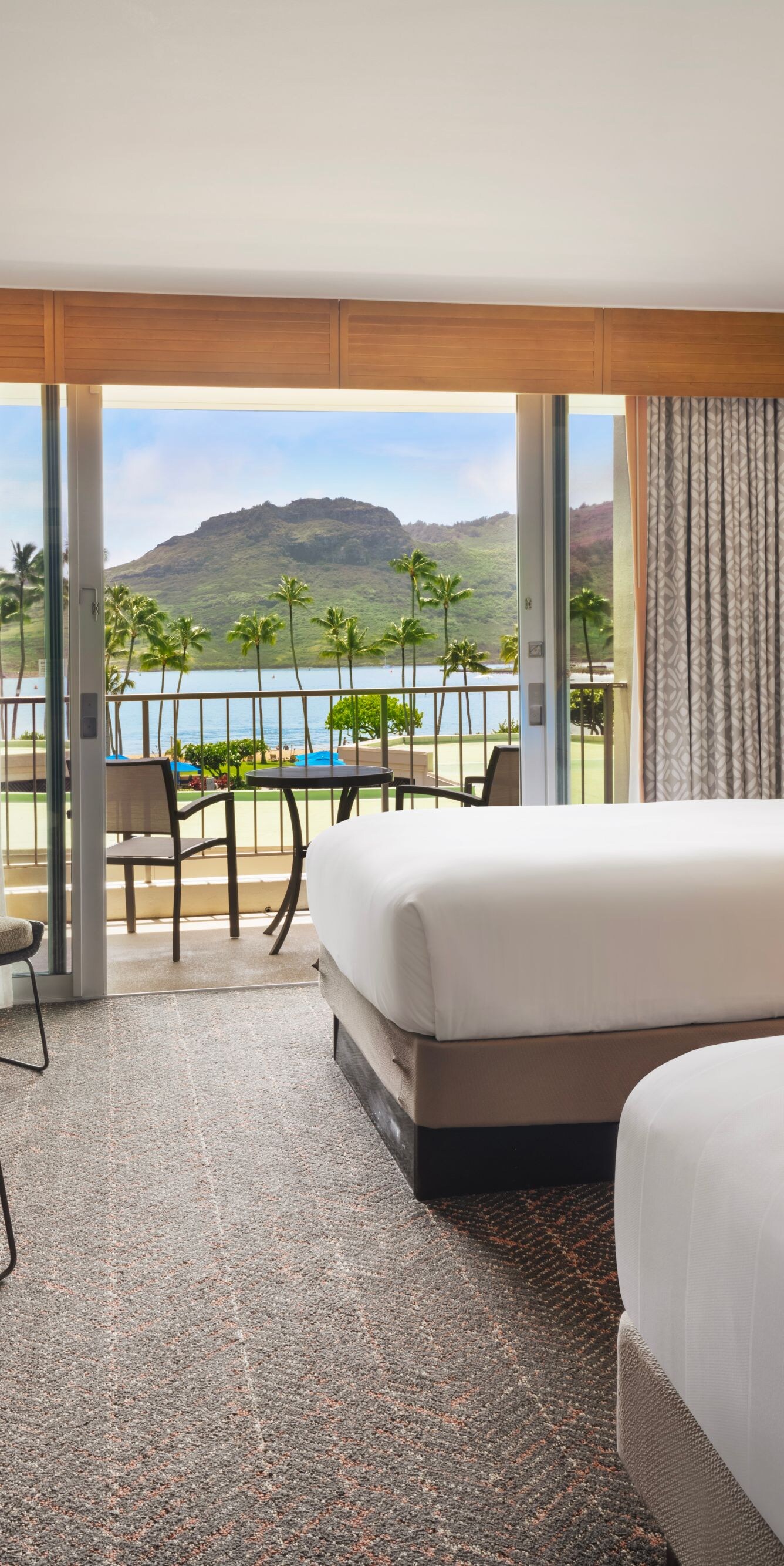 Two double beds and furnished balcony