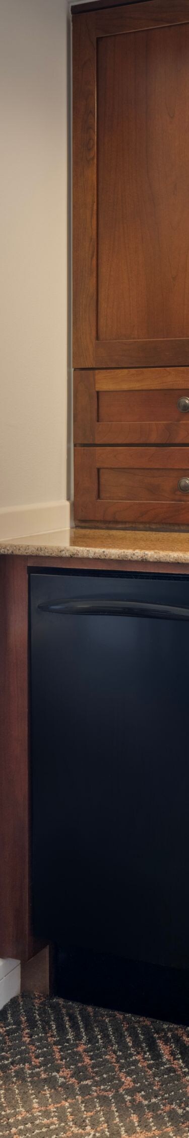 Sofa and counter with microwave, coffee maker