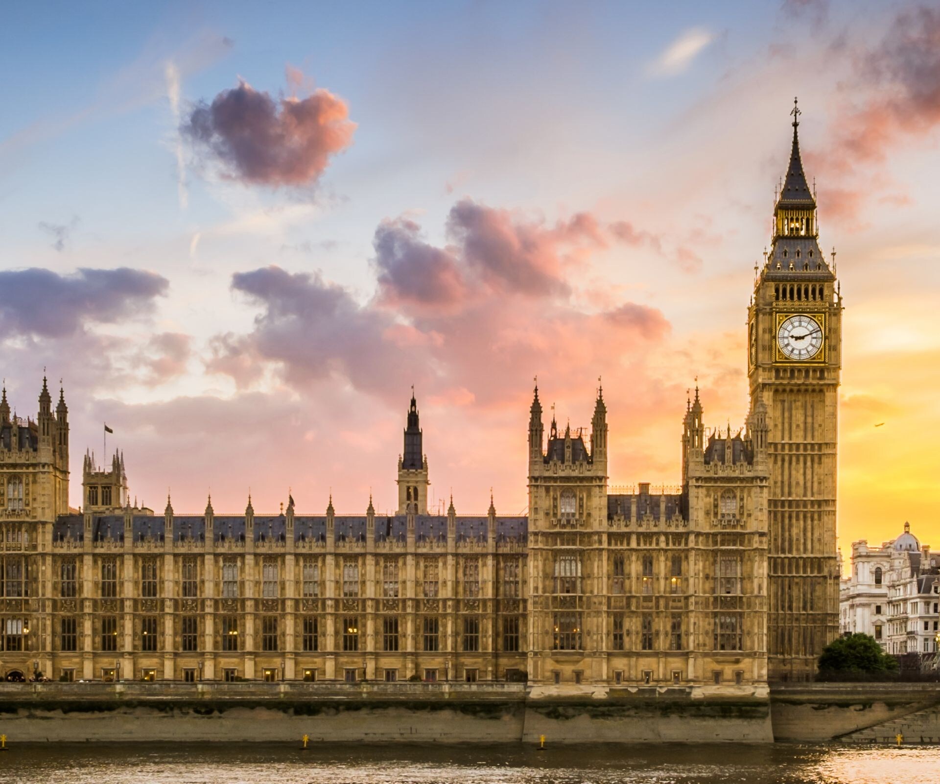 Big Ben and river at sunset in London