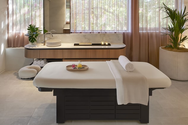 Massage table in spa treatment room