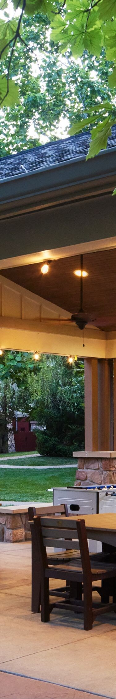 Patio with tables, chairs, foosball, table tennis