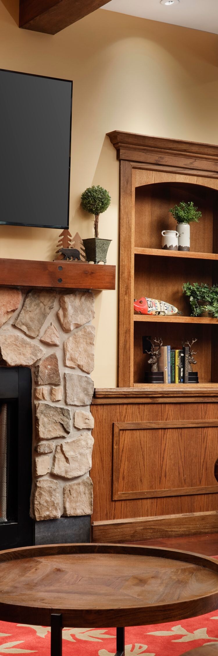 Seating and fireplace with TV on wall