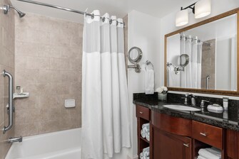 Bathroom with sink and shower/tub combination