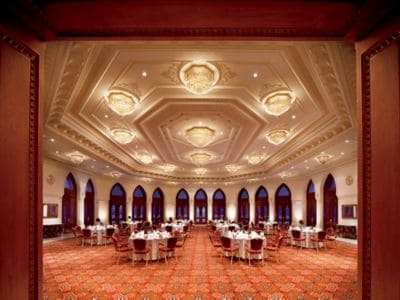 Soaring ceilings and wraparound windows of the Qantab Room for your events in Muscat