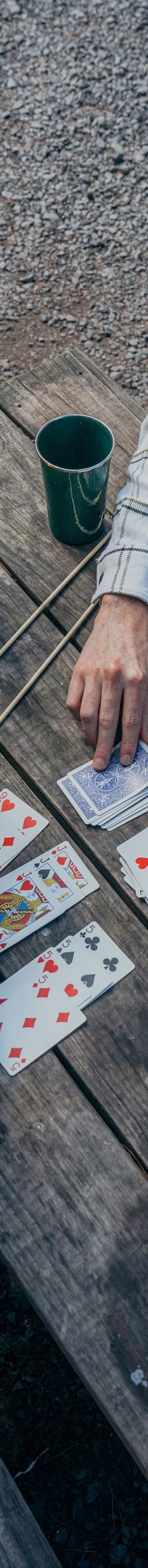 Couple playing games outside cabin