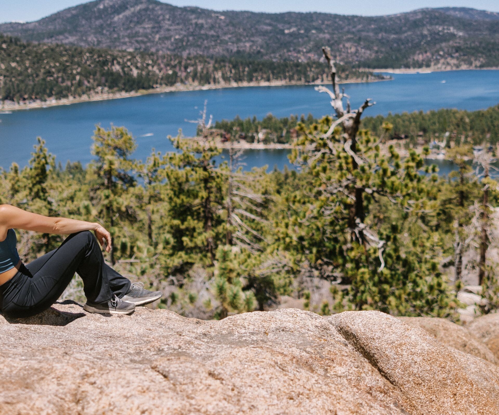woman on a scenic hike lake view
