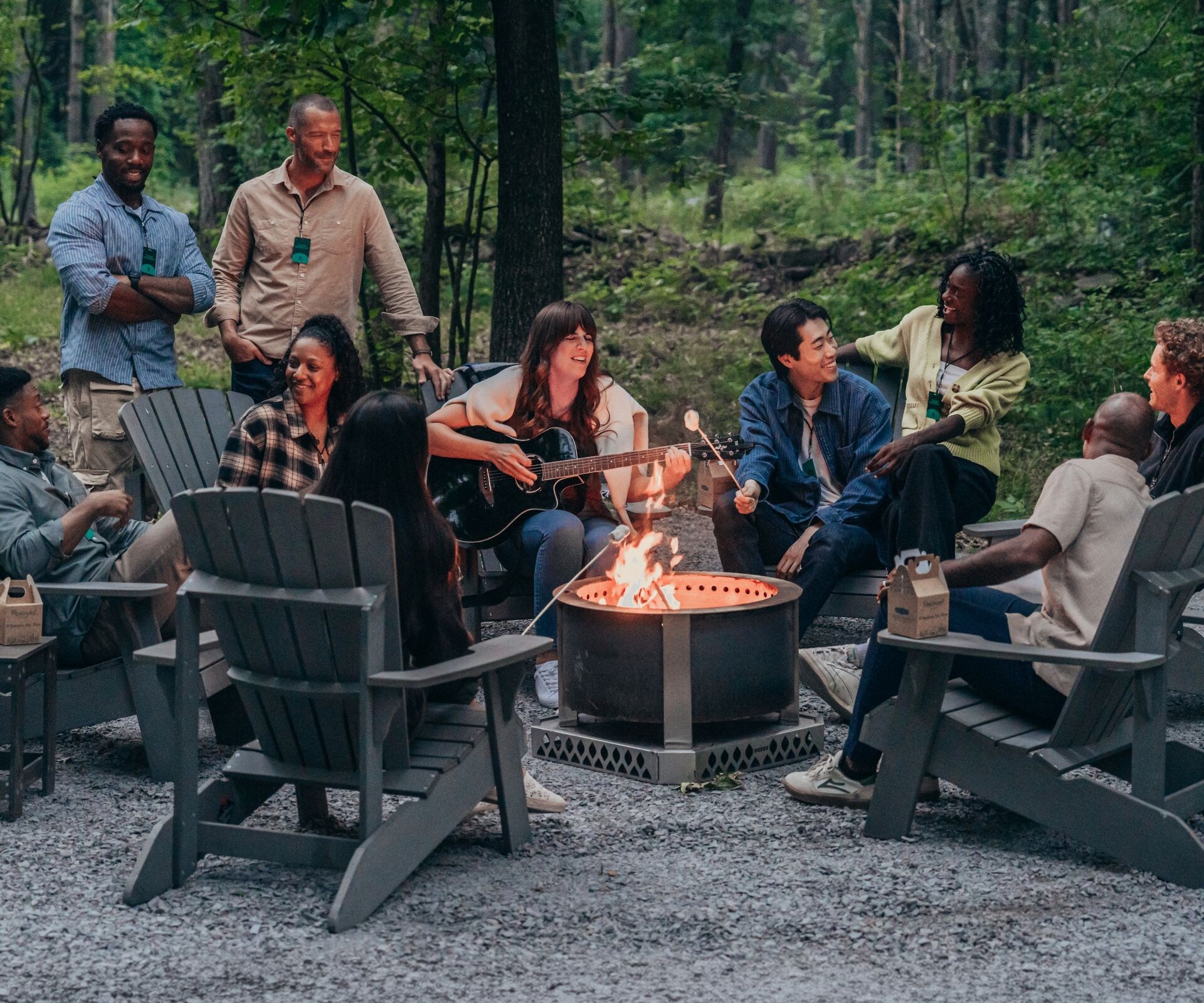 Group Event People Singing Around Campfire