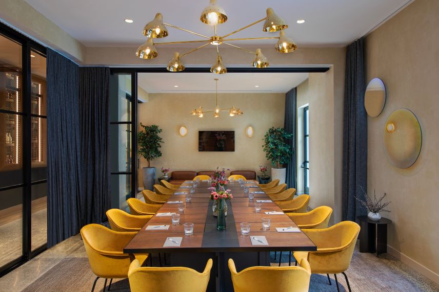Meeting Room with long table and 14 chairs