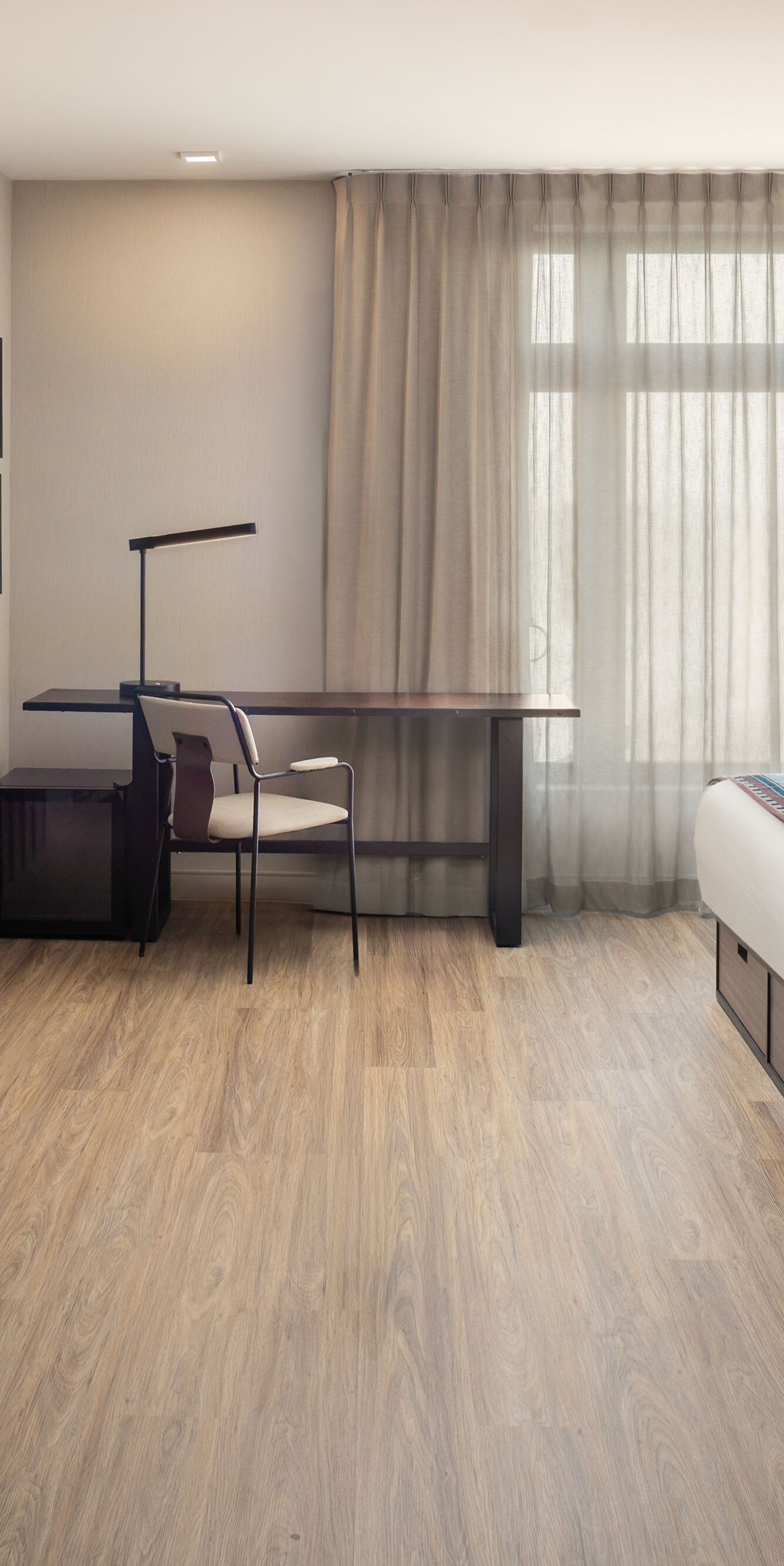 Two queen beds and workspace