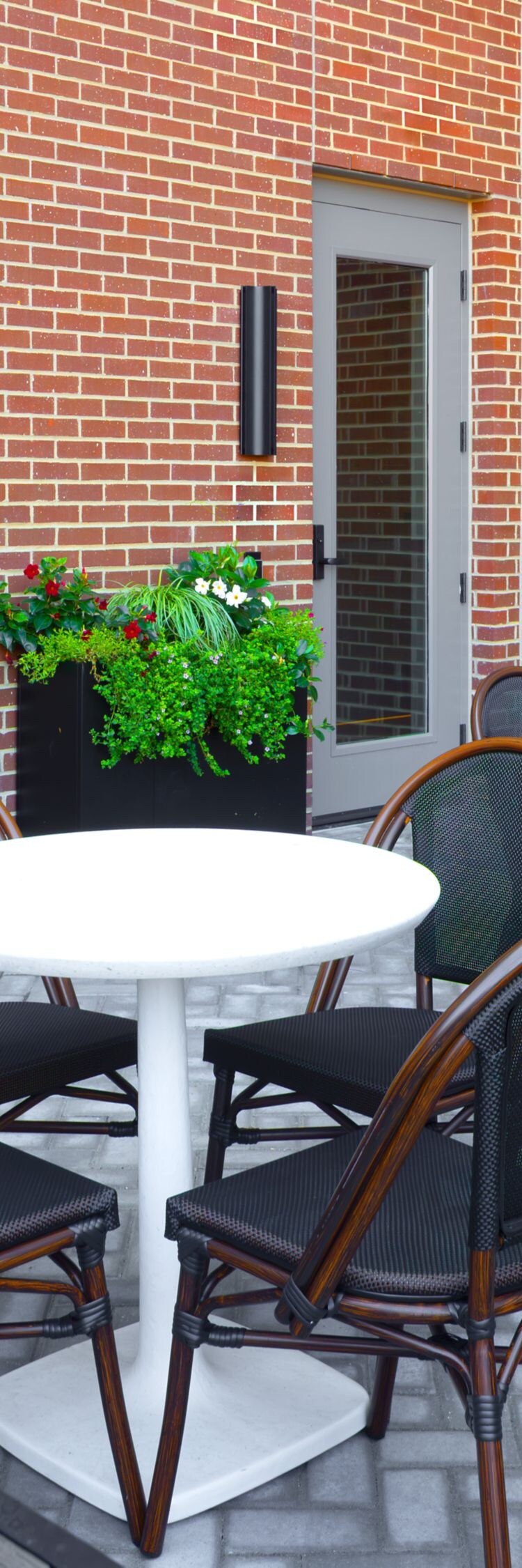 Patio with seating and grill